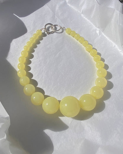 mega necklace with graduated beads in yellow 